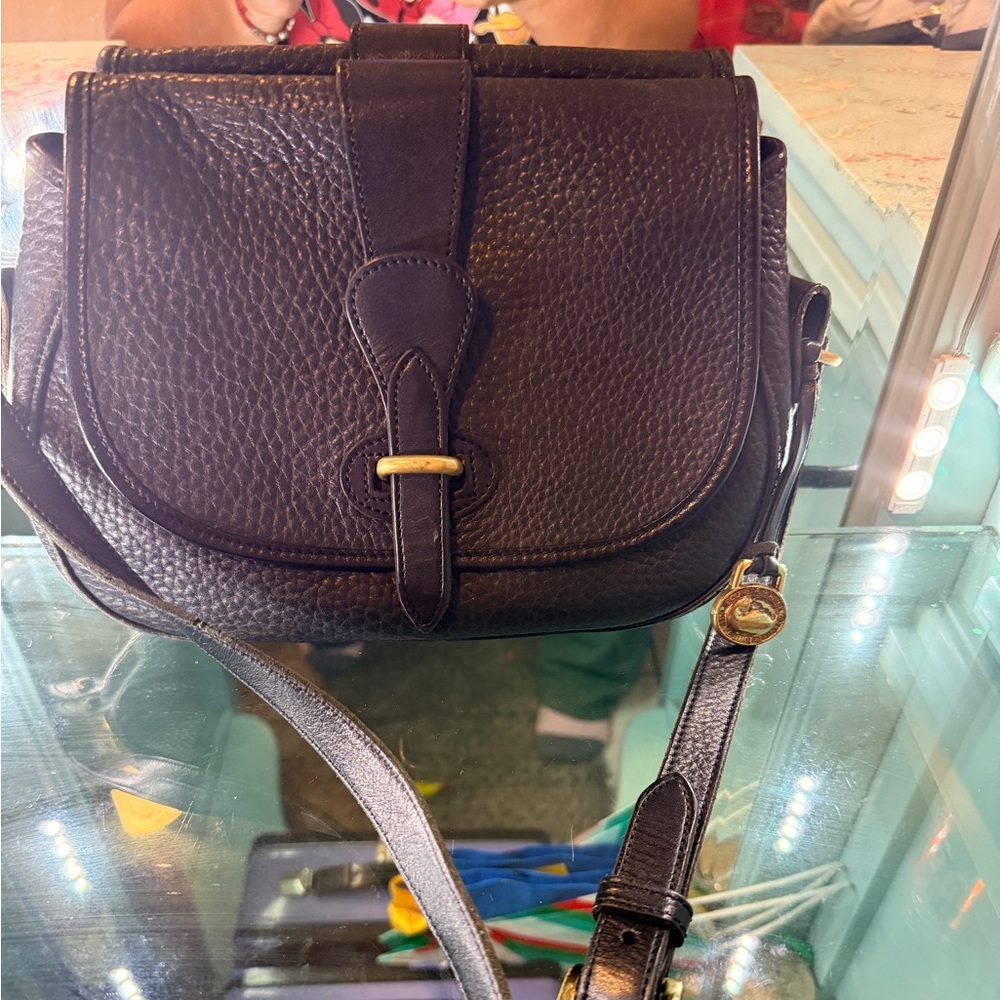Dooney & Bourke Black Crossbody Bag with Gold Accents